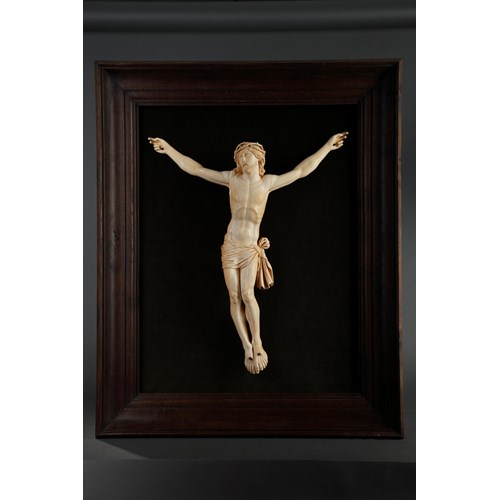 A carved ivory figure of the Crucified Christ